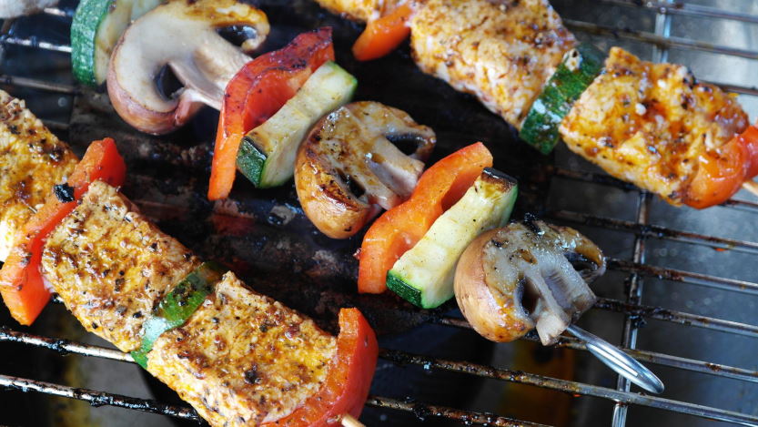 meat and vegetables on the grill