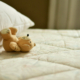 teddy bear on bed