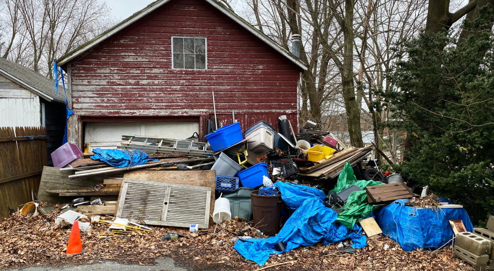 pile of junk outside the house 