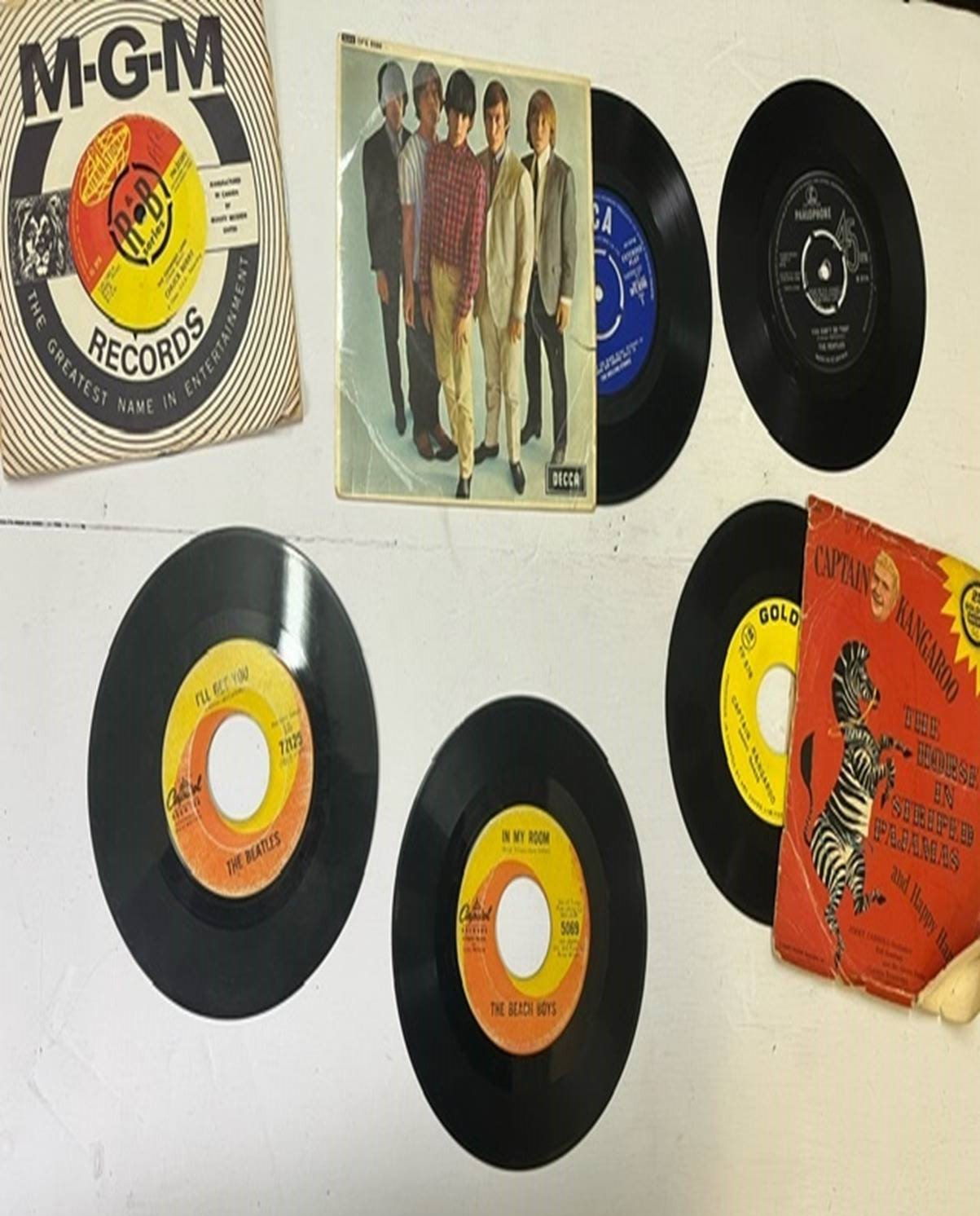collection of vinyl records and art